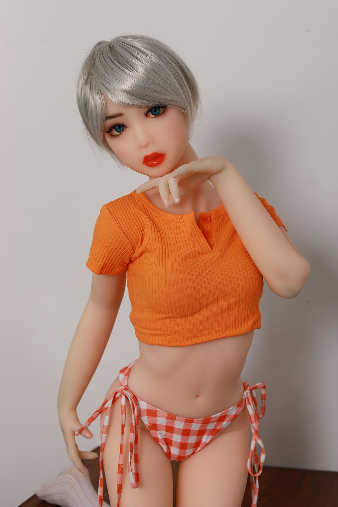 4ft Japanese TPE flat chested love doll in orange shirt
