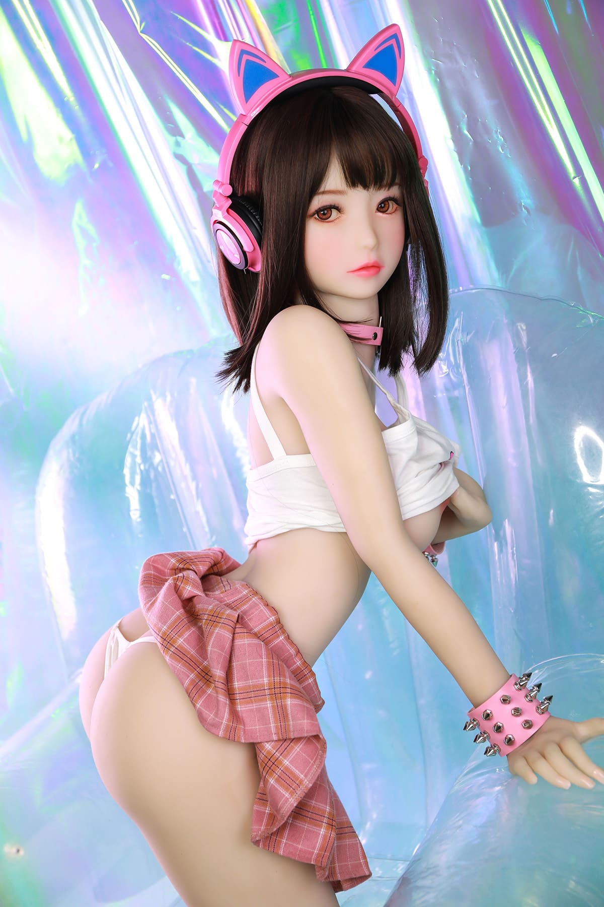 Teenage girl sex doll with cat ear headphones