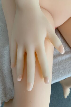 The hand of white skin TPE sex doll