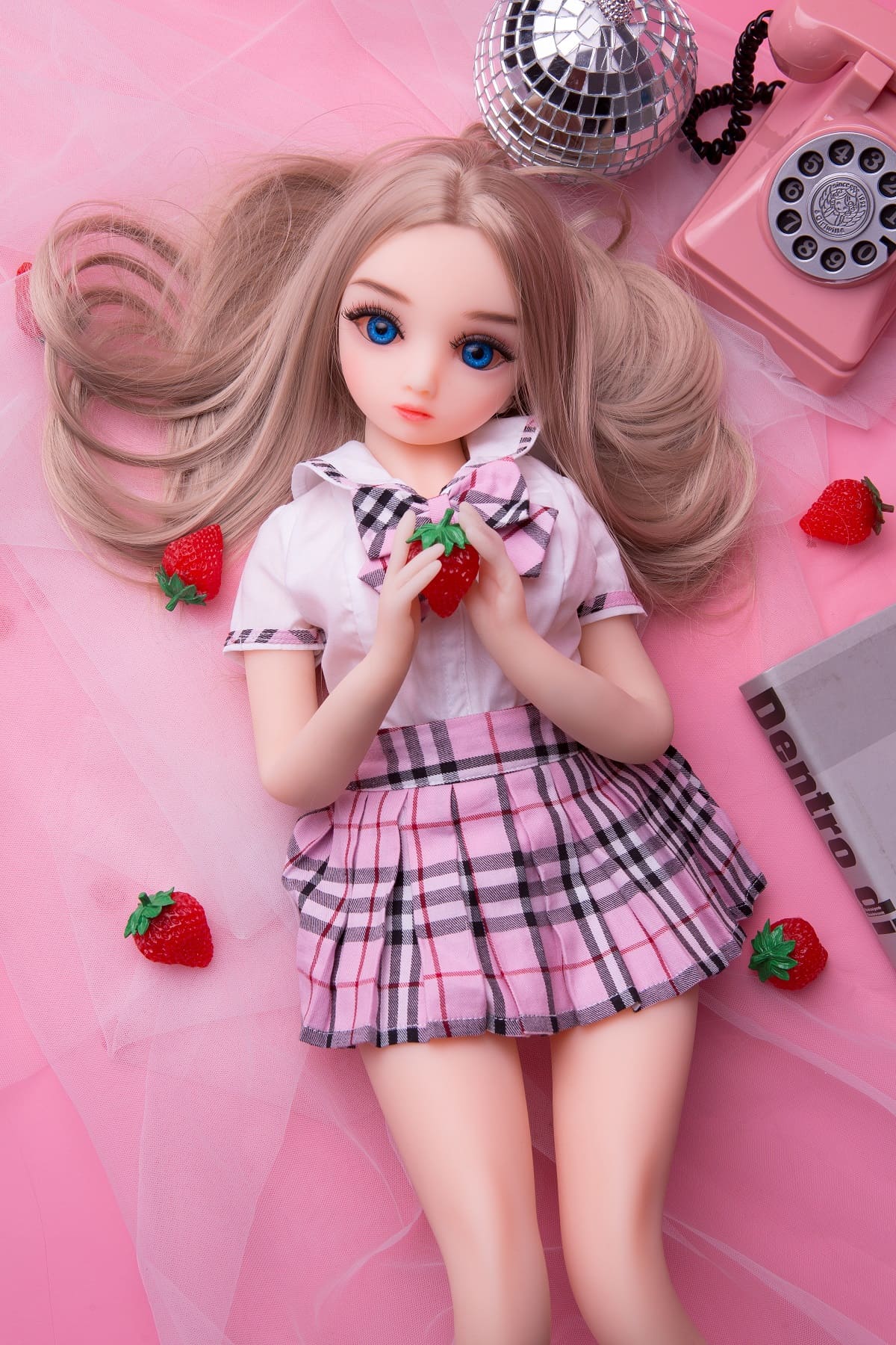 65cm cute blue eyed mini sex doll holding a strawberry