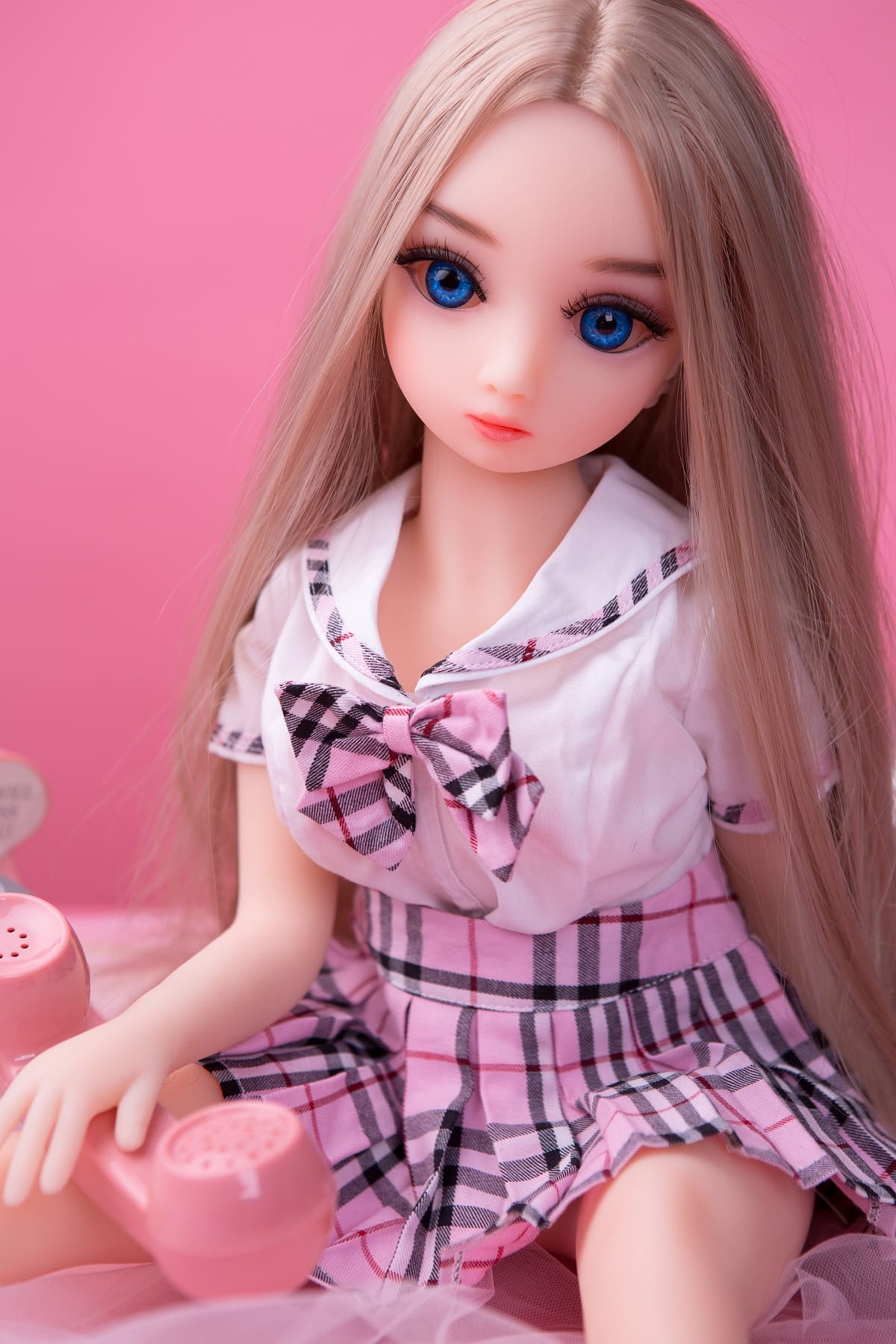 Cute 65cm miniature sex doll dressed in a school uniform